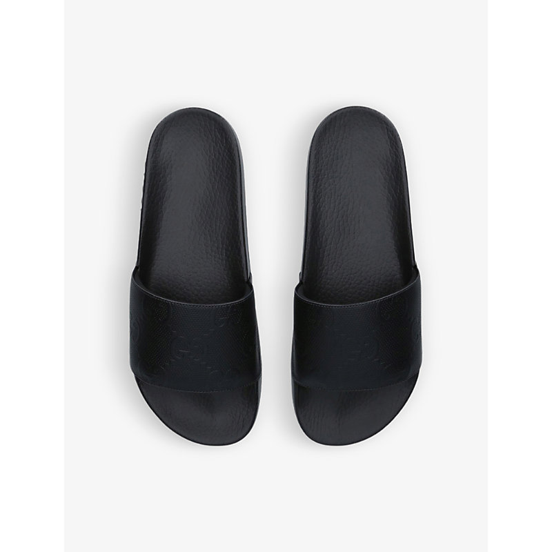 Shop Gucci Pursuit Gg-motif Rubber Sliders In Black
