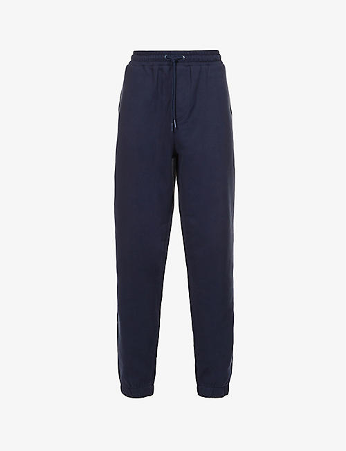 TOMMY JEANS: Elevated logo-patch organic cotton-blend jogging bottoms