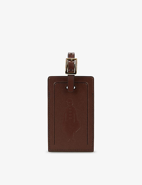 GLOBE-TROTTER: Globe-Trotter x GOLF le FLEUR graphic-embossed leather luggage tag