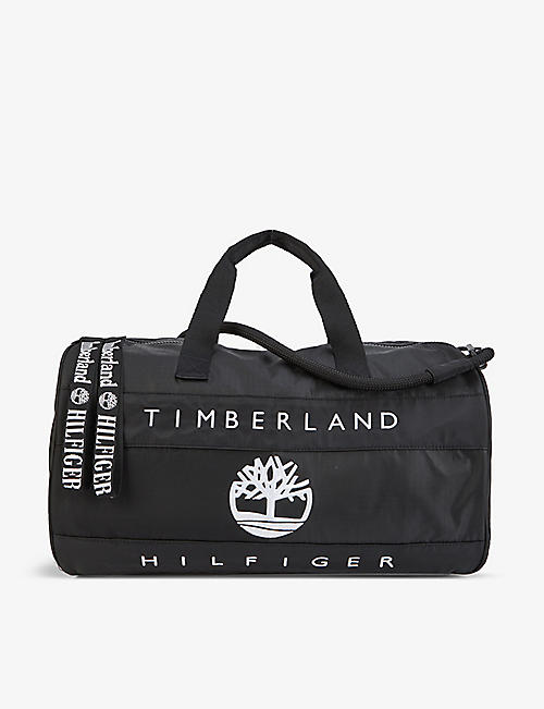TOMMY HILFIGER: Tommy Hilfiger x Timberland logo-embroidered shell duffle bag