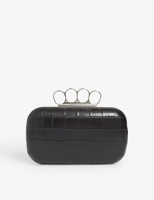 ALEXANDER MCQUEEN: Four-ring leather clutch bag