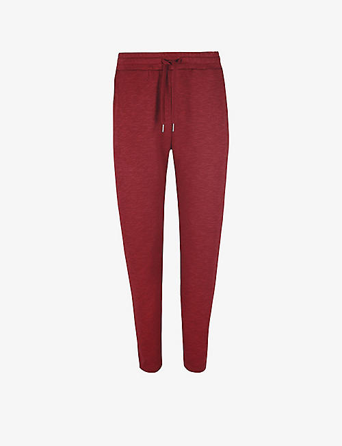 SWEATY BETTY: Essentials tapered high-rise organic cotton-blend trousers