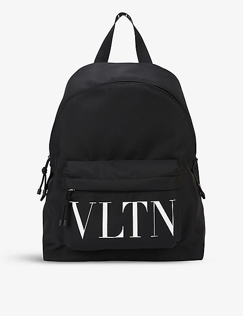 VALENTINO GARAVANI: Brand-print zipped shell backpack