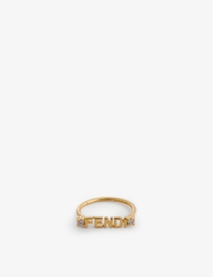 FENDI Signature logo plaque gold toned and cubic zirconia ring