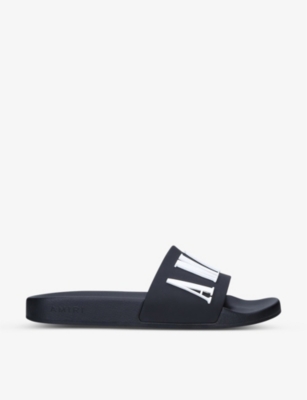 AMIRI: Logo-emblazoned rubber pool slides