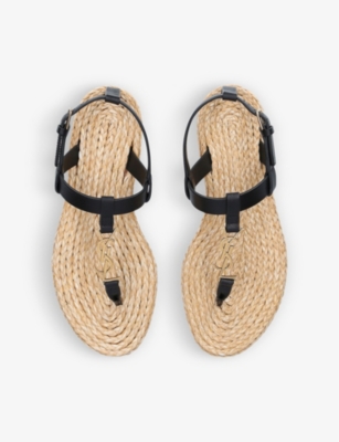 Shop Saint Laurent Women's Black Cassandra Flat Patent-leather Sandals