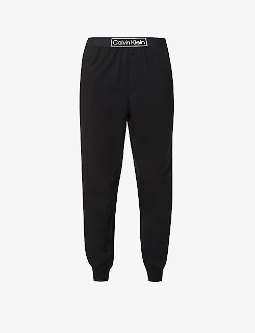 CALVIN KLEIN：Reimagined 徽标带休闲版型中腰棉质再生聚酯纤维混纺慢跑裤 