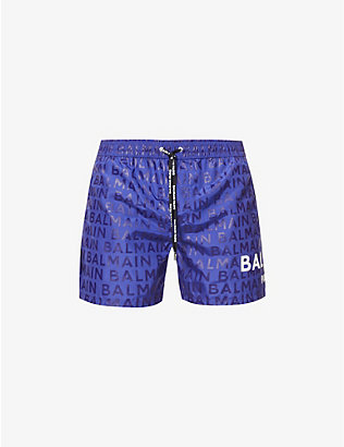 BALMAIN - Monogram-print regular-fit swim shorts | Selfridges.com