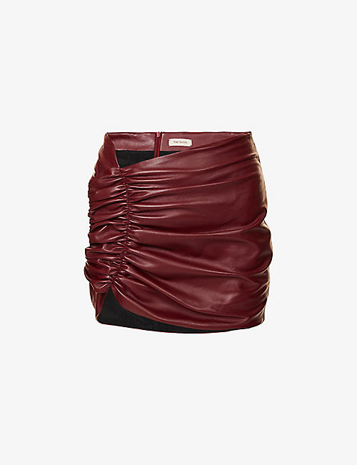 THE MANNEI: Kos ruched high-waist leather mini skirt