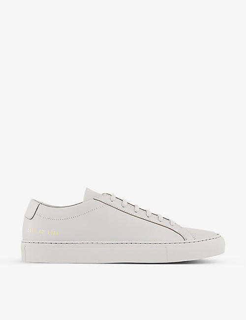 COMMON PROJECTS: Achilles logo-print suede low-top trainers