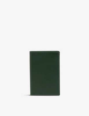 COMME DES GARCONS: Classic logo-embossed leather card holder