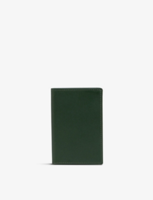 COMME DES GARCONS Classic logo embossed leather card holder Selfridges