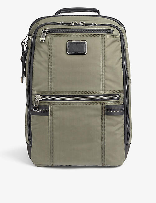 TUMI: Dynamic multi-pocket shell backpack