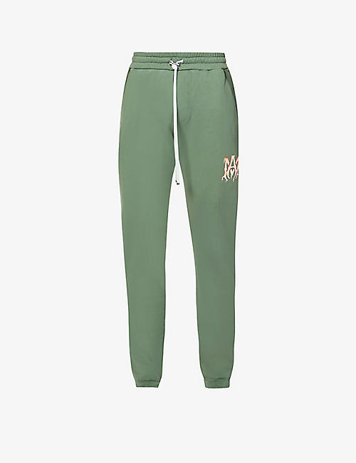 AMIRI: Logo-print relaxed-fit cotton-jersey jogging bottoms