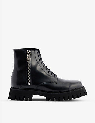 GUCCI: Oversized-sole leather ankle boots