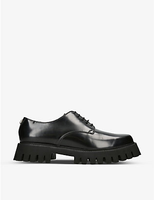 GUCCI: Derby track-sole leather loafers