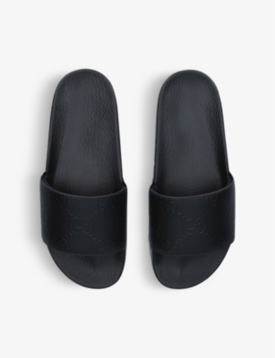 Shop Gucci Pursuit Gg-motif Matt Rubber Sliders In Black