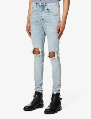 - Ripped-knee regular-fit stretch-denim jeans | Selfridges.com