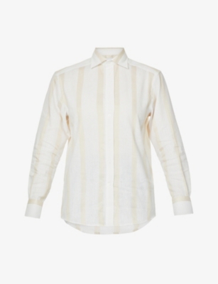 WITH NOTHING UNDERNEATH: The Boyfriend striped linen and cotton-blend shirt