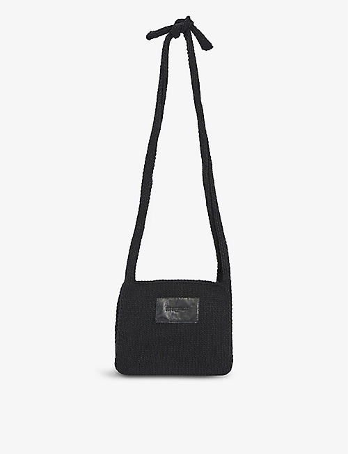 SITUATIONIST: Logo-patch handknitted cotton cross-body bag