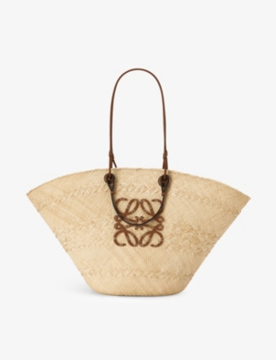 LOEWE: Loewe x Paula’s Ibiza Anagram large iraca palm and leather basket bag