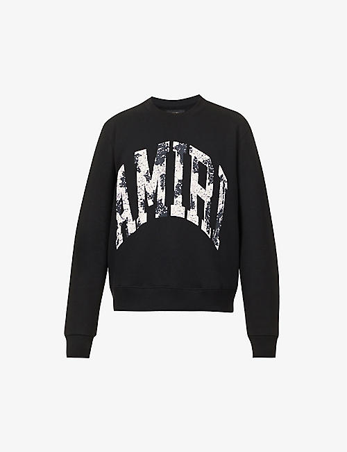 AMIRI: Collegiate distressed logo-print boxy-fit cotton-jersey sweatshirt