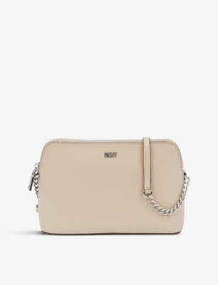 DKNY Bryant dome shape leather cross body bag Selfridges