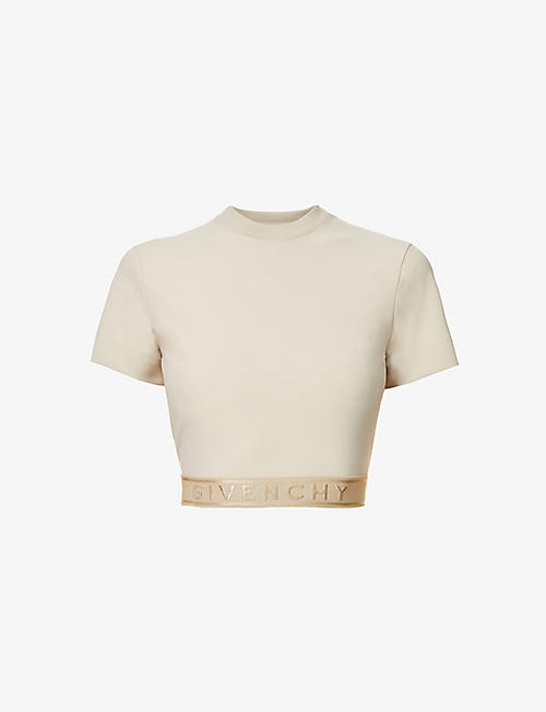 GIVENCHY: Cropped logo-embossed stretch-woven top
