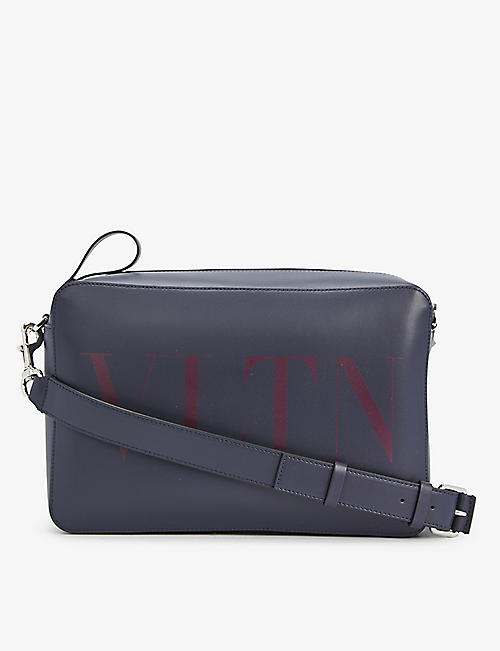 VALENTINO GARAVANI: Logo-print adjustable-strap leather cross-body bag