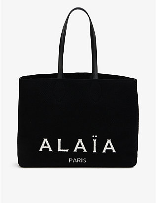 ALAIA: Logo-print woven tote bag