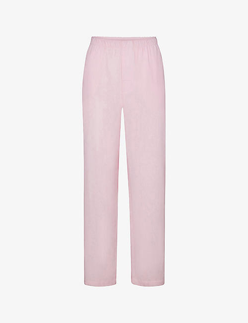 SKIMS: Hotel mid-rise wide-leg cotton-blend trousers