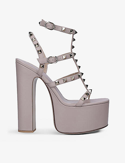 VALENTINO GARAVANI: Rockstud studded leather heeled platform sandals