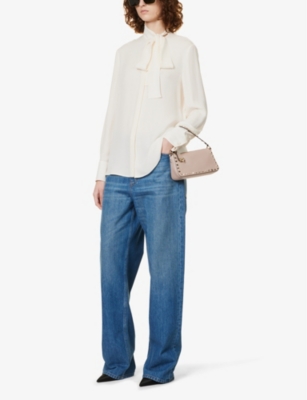 Spike small leather baguette bag