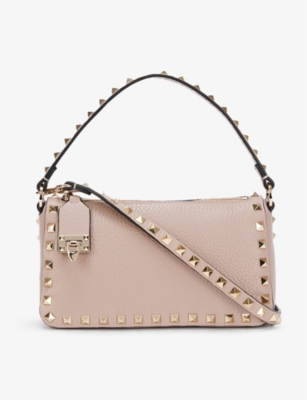 Valentino Garavani Spike Small Leather Baguette Bag In Poudre