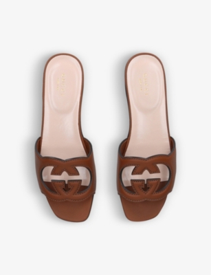 GUCCI Interlocking G cut-out leather sliders