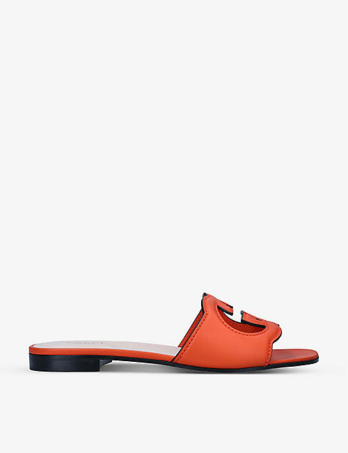 GUCCI: Interlocking G cut-out leather sliders