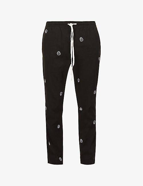 PACSUN: Kade smiley-embroidered stretch-cotton trousers