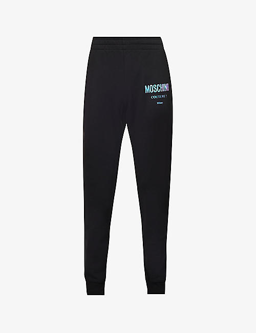 MOSCHINO: Iridescent logo-print organic-cotton-jersey jogging bottoms