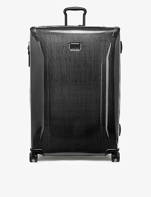 TUMI: Extended Trip expandable four-wheel shell packing suitcase
