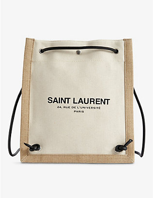 SAINT LAURENT: Brand-patch text-print cotton-blend cross-body bag