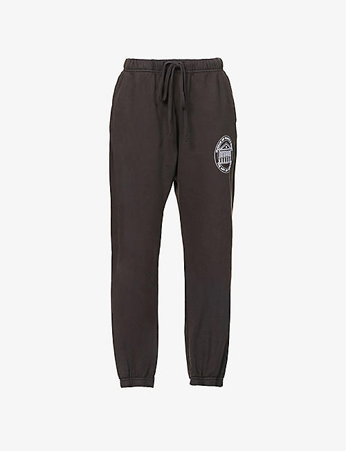 MUSEUM OF PEACE AND QUIET: Headquarters logo-patch tapered relaxed-fit high-rise cotton-jersey jogging bottoms