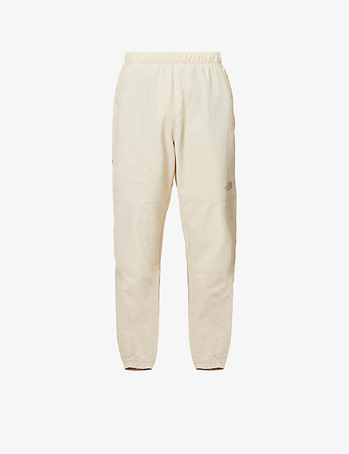 THE NORTH FACE: Logo-embossed pannelled shell jogging bottoms