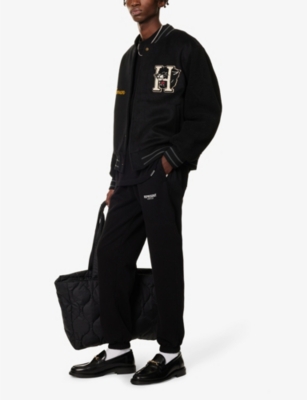 Shop Represent Owners' Club Text-print Relaxed-fit Cotton-jersey Jogging Bottoms In Black