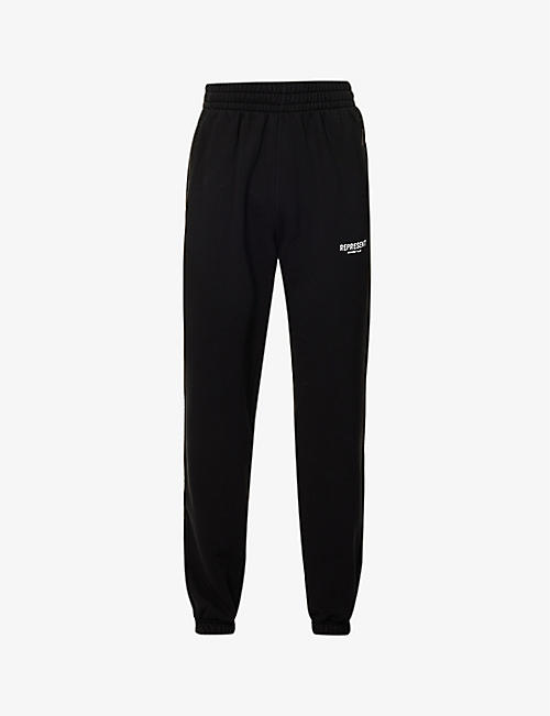 REPRESENT: Owners' Club text-print relaxed-fit cotton-jersey jogging bottoms