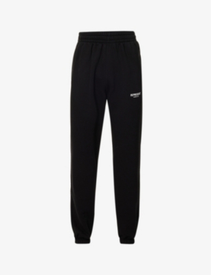 Shop Represent Owners' Club Text-print Relaxed-fit Cotton-jersey Jogging Bottoms In Black