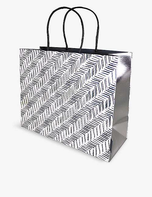 DEVA DESIGNS: Herringbone-print medium gift bag 28cm
