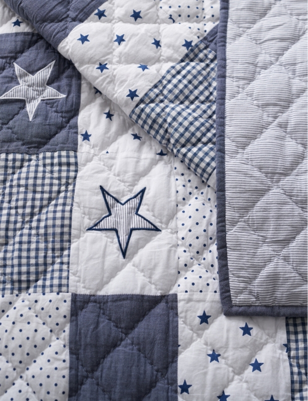 Patchwork reversible cotton and linen-blend cot bed quilt