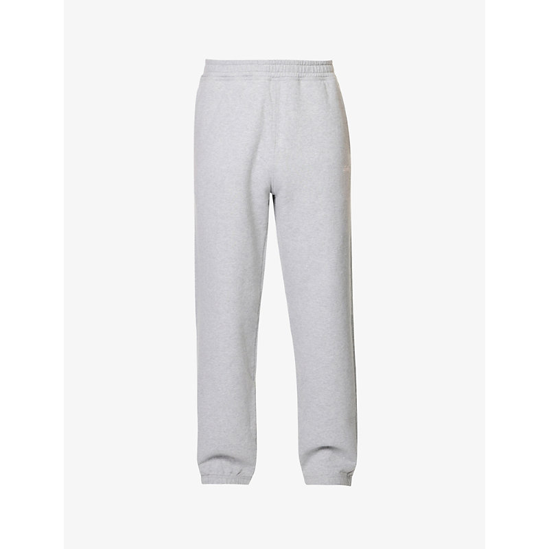 Stussy Stock Logo-embroidered Tapered-leg Cotton Jogging Bottoms In Grey