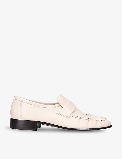 THE ROW: Contrast-stitching pleated leather loafers