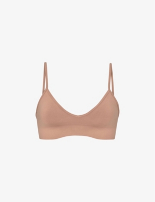 Skims Smoothing V-neck Stretch-woven Bralette In Brown